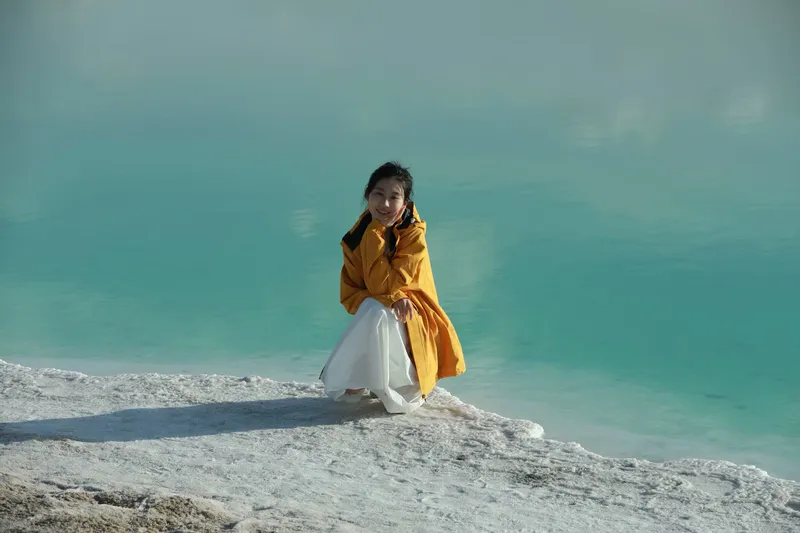她