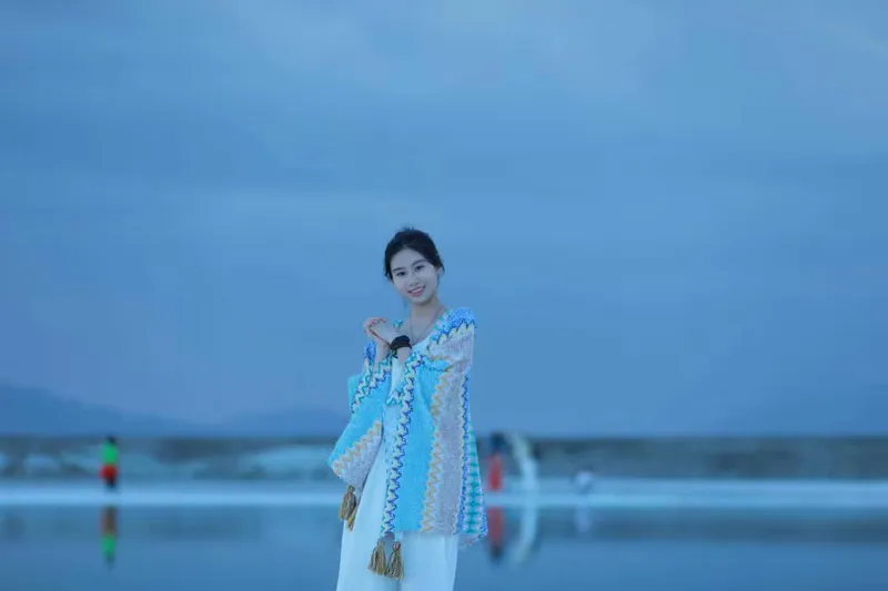 她