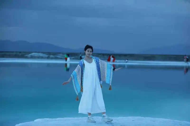 她