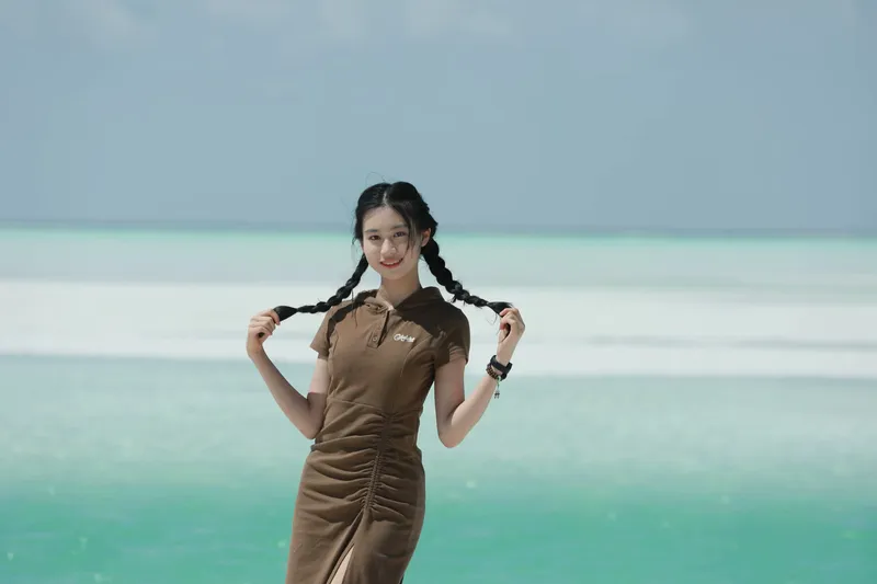 她